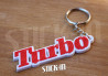 Schlüsselanhänger – Renault 5 Alpine Turbo – Rot & Weiß – Logo-Aufkleber Flügel Monogramm Karosserie