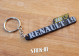 Renault 19 16V Schlüsselanhänger aus weichem PVC mit Monogramm und R19-Logo
