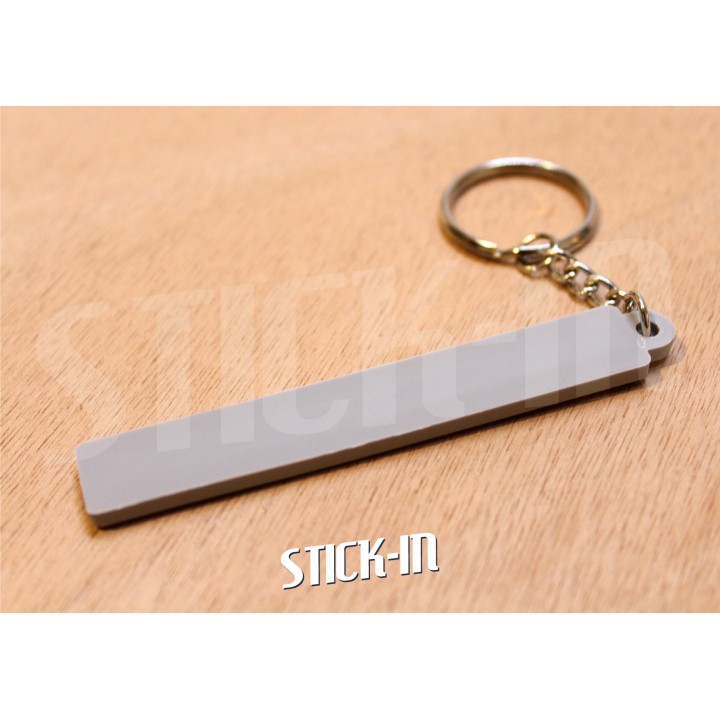 Porte clés Land Rover Defender PVC souple monogramme logo calandre capot