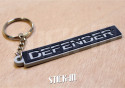 Schlüsselanhänger – Land Rover Defender – Kühlergrillhaube aus weichem PVC mit Monogramm-Logo