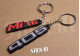 Set of 2 Keychains Peugeot 405 + Mi16 soft PVC keyrings monogram badge logo