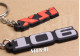 2er-Pack Peugeot 106 + XSi Schlüsselanhänger aus weichem PVC mit Monogrammen und Logos