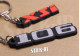 2er-Pack Peugeot 106 + XSi Schlüsselanhänger aus weichem PVC mit Monogrammen und Logos