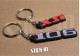 2er-Pack Peugeot 106 + XSi Schlüsselanhänger aus weichem PVC mit Monogrammen und Logos