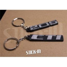 Confezione da 2 portachiavi Peugeot 205 + CTI in PVC morbido con monogrammi e loghi