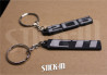 Set of 2 Keychains - Peugeot 205 + CTI - soft PVC keyrings monograms badges logos