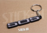 Schlüsselanhänger - Peugeot 505 - Monogramm-Logo aus Weich-PVC