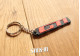 Schlüsselanhänger – Peugeot 205 309 GTI 1.6 1.9 Griffe – Monogramm-Logo aus weichem PVC
