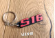 Porte Clés - Peugeot 106 306 S16 - PVC Souple Logo Monogramme Aile