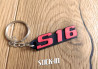 Schlüsselanhänger – Peugeot 106 306 S16 – Flügel-Monogramm-Logo aus weichem PVC